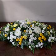 Yellow and white coffin spray